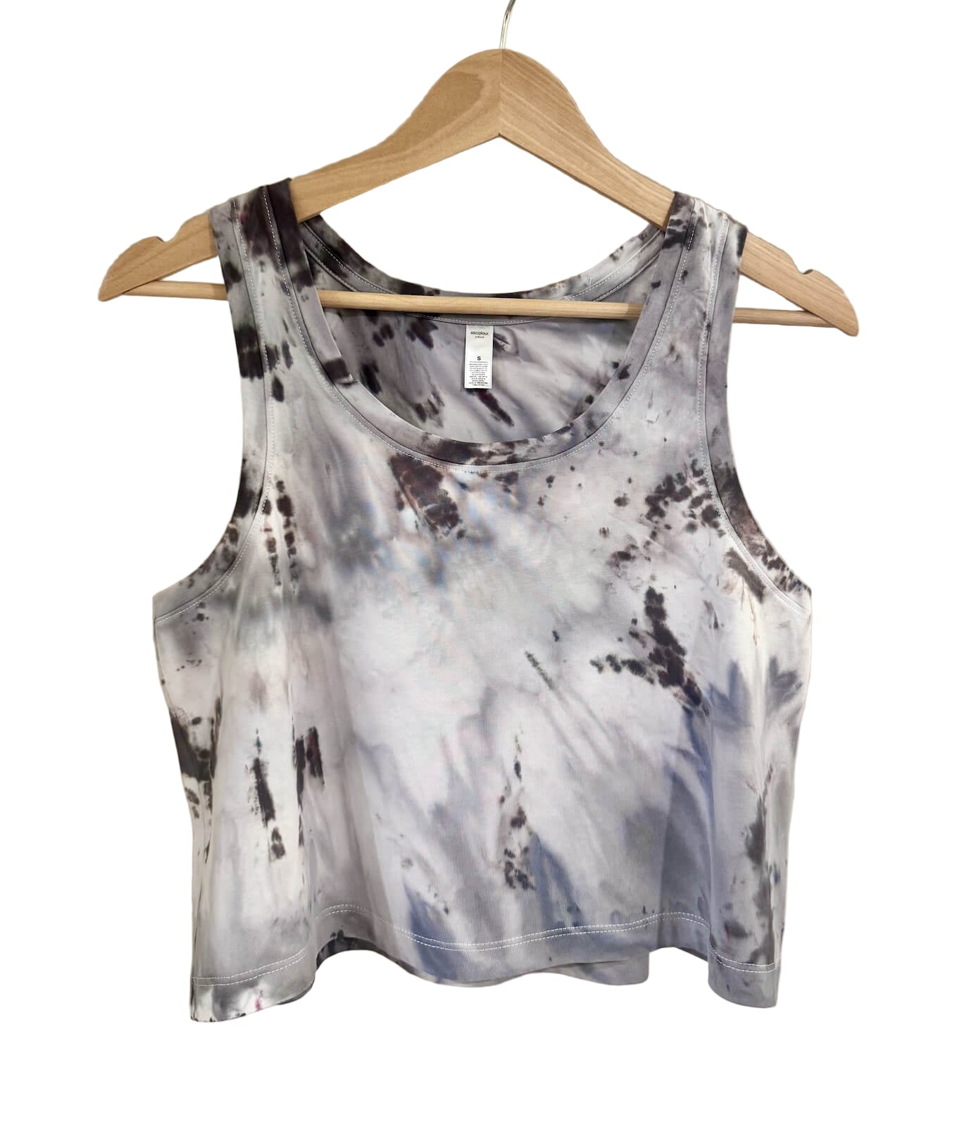 Front view of black grey and white hand ice-dyed gravity dye woman's crop tank with fluid, watercolor texture