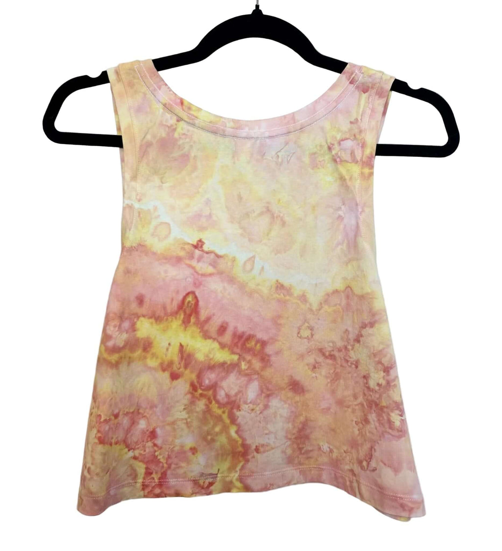 Back view of orange and yellow sunset tones hand ice-dyed woman's crop tank with fluid, watercolor texture