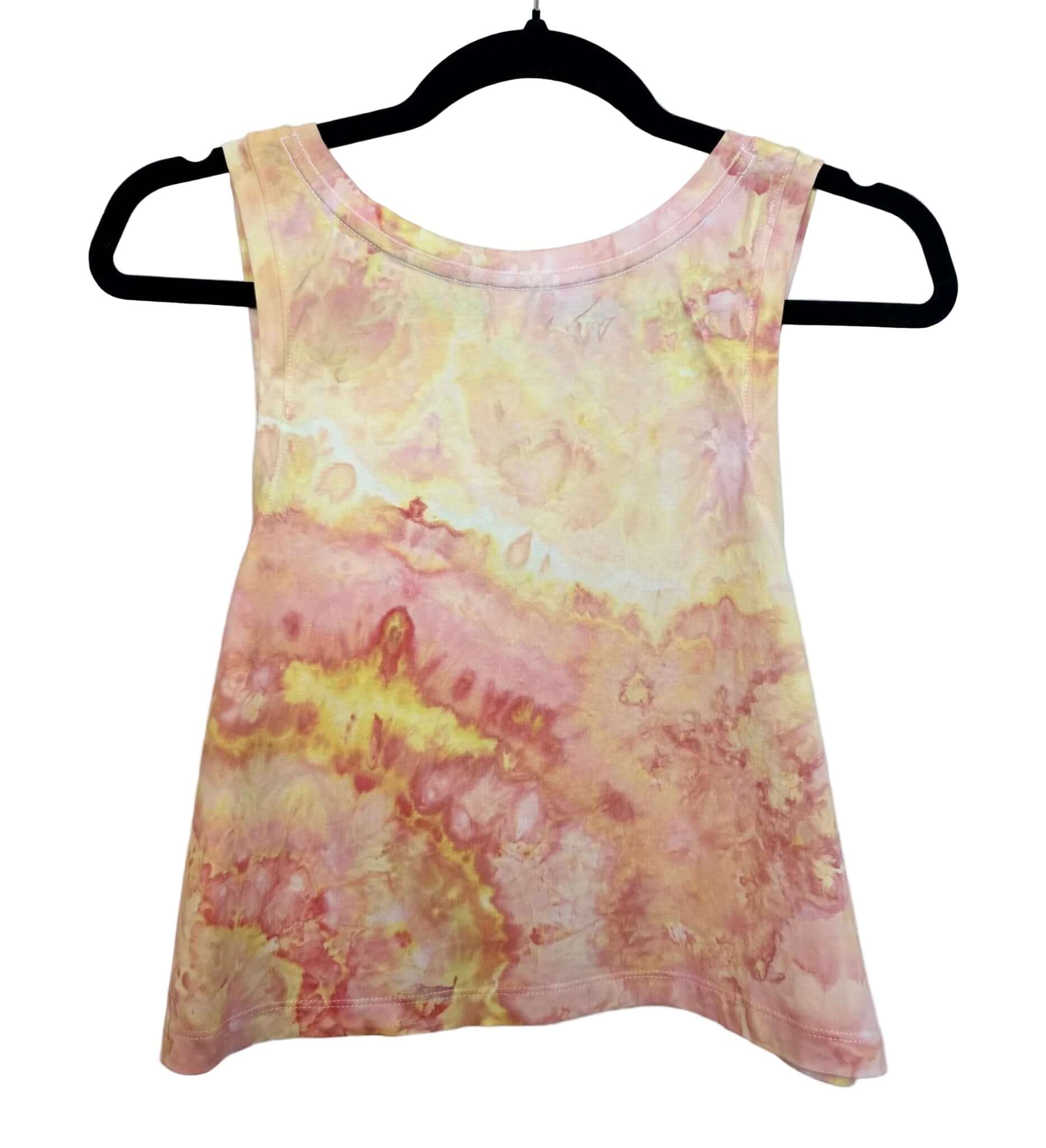 Back view of orange and yellow sunset tones hand ice-dyed woman's crop tank with fluid, watercolor texture