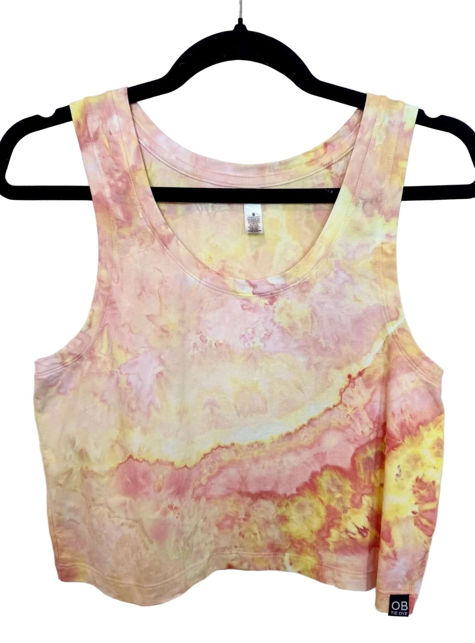 Front view of orange and yellow sunset tones hand ice-dyed woman's crop tank with fluid, watercolor texture