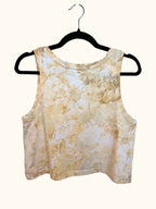 Back view of soft yellow and white sunlight tones with uv reactive dye hand ice-dyed woman's crop tank with fluid, watercolor texture