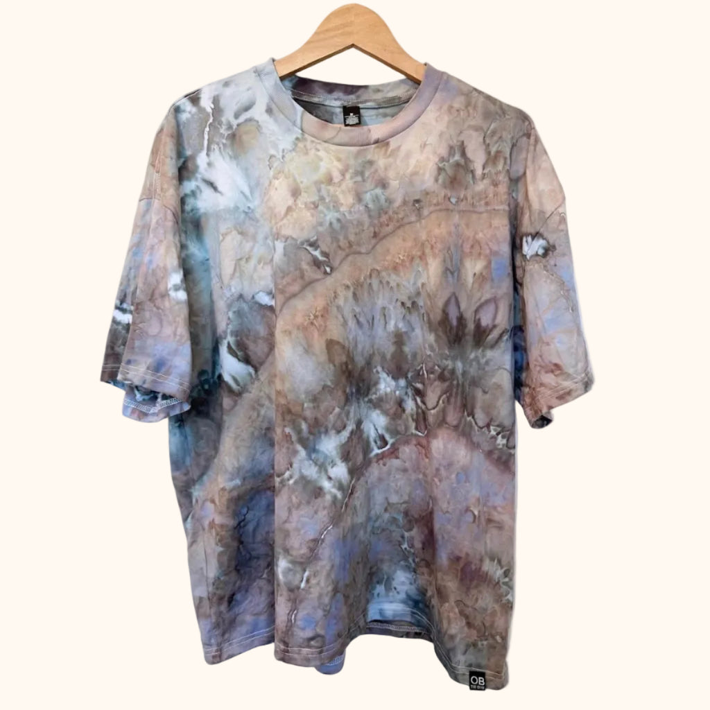 Hand-dyed ice dye oversized tee with organic, coastal-inspired color pattern