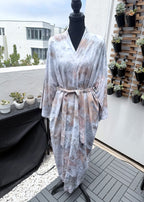 Long hand ice-dyed kimono robe in soft stone grey and sand tones, shown on a mannequin