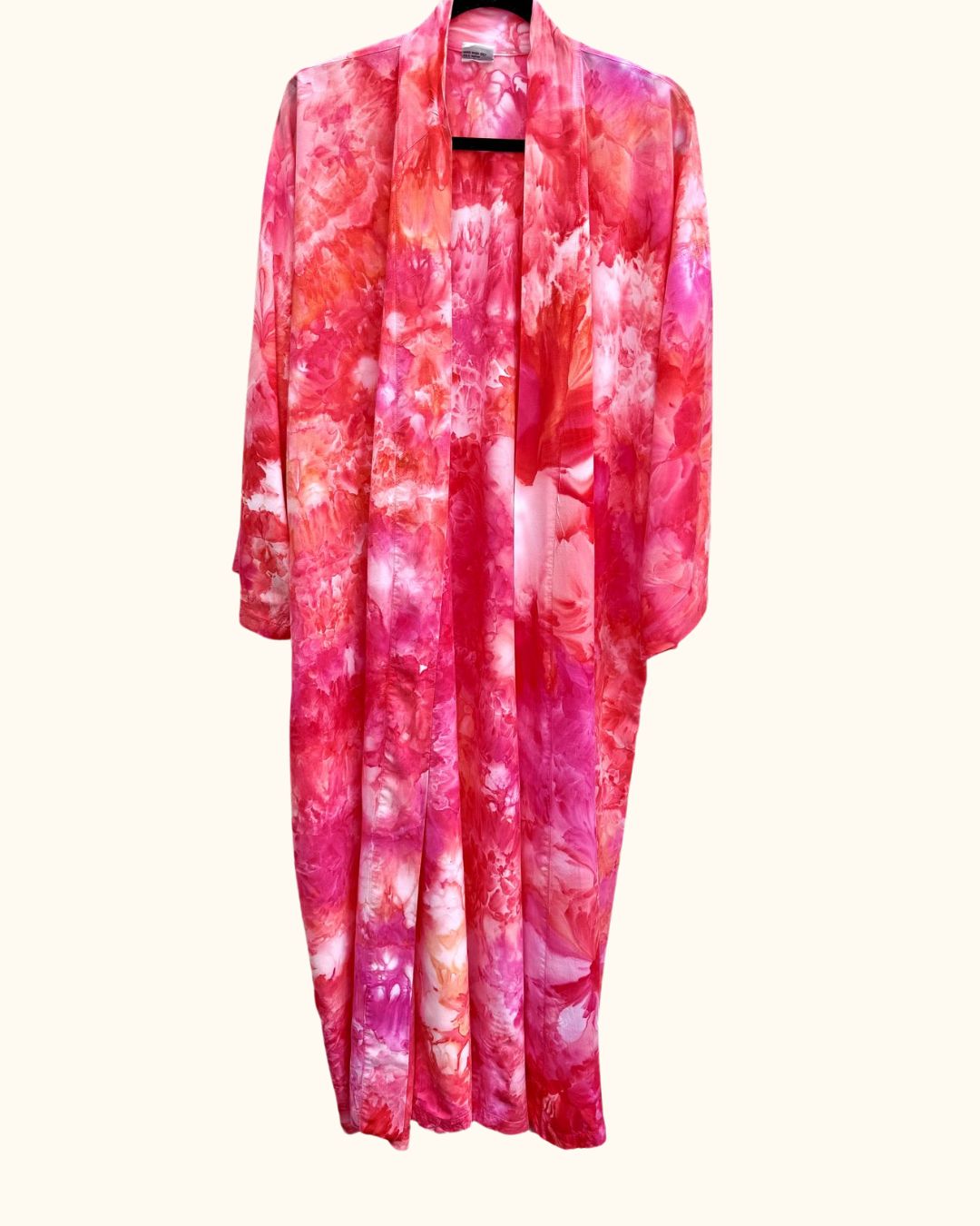 Long hand ice-dyed kimono robe in warm sunset pinks, corals, and oranges