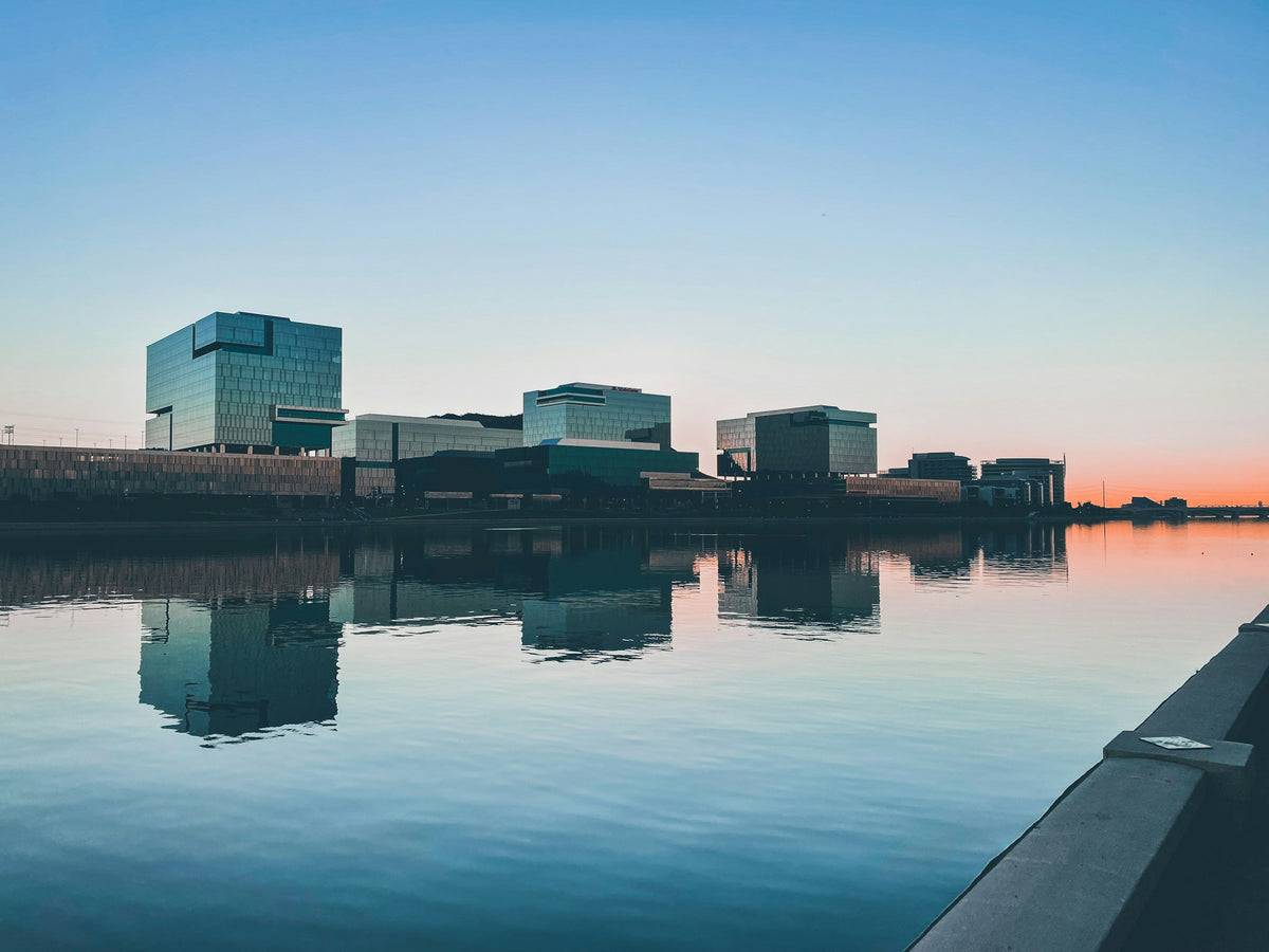 Tempe Town Lake at sunset with the downtown Tempe skyline reflected in the water