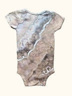 Hand-dyed ice dye hand dyed baby onesie with organic, coastal-inspired color pattern
